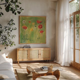 Poppies in Light Breeze by Michael Clark. Shown in a natural wood frame in a cozy modern living room. Available as an archival giclee rolled canvas, fine art paper, or poster print. SKU 8730a.