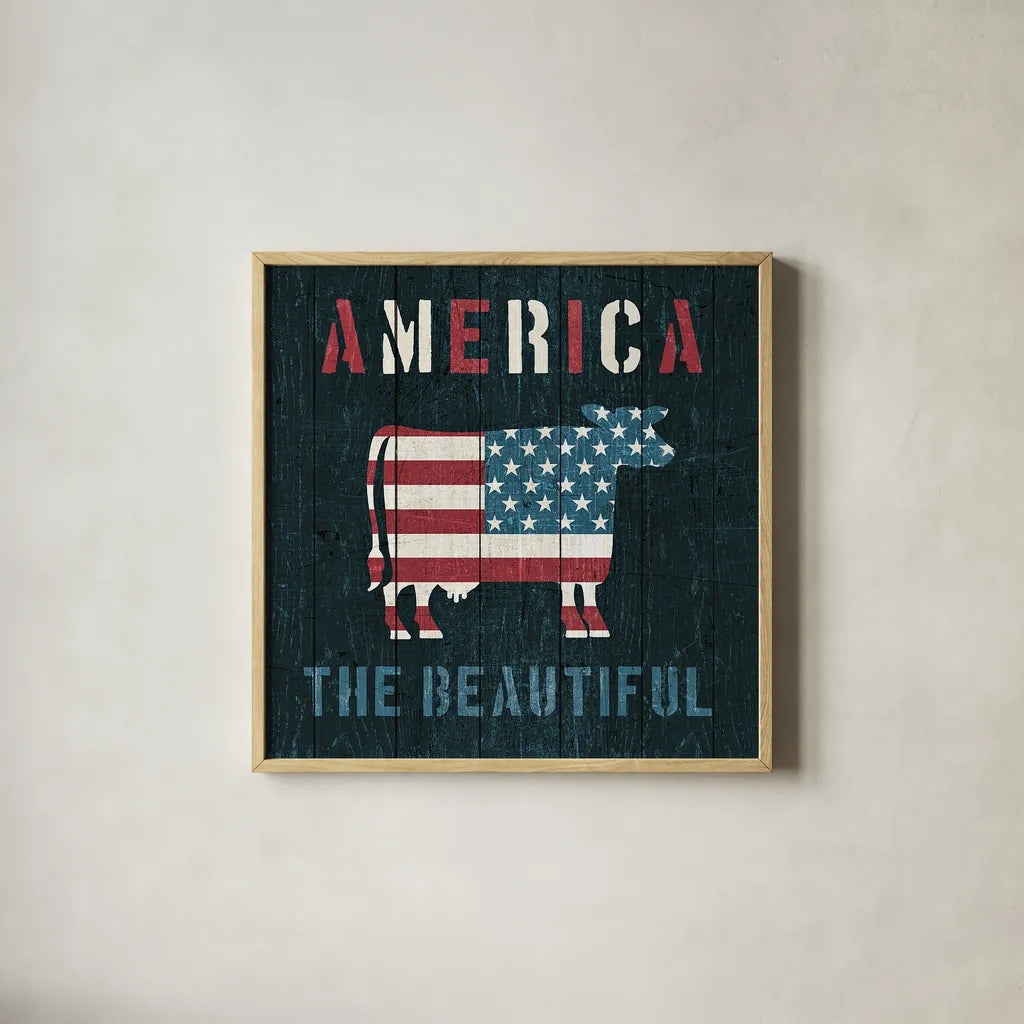 American Farm Cow by Michael Mullan. Shown in a natural wood glass frame for a timeless modern aesthetic. Available as an archival giclee rolled canvas, fine art paper, or poster print. SKU 17541a.