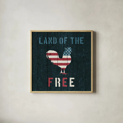 American Farm Rooster Red White and Blue by Michael Mullan. Shown in a natural wood glass frame for a timeless modern aesthetic. Available as an archival giclee rolled canvas, fine art paper, or poster print. SKU 17539a.