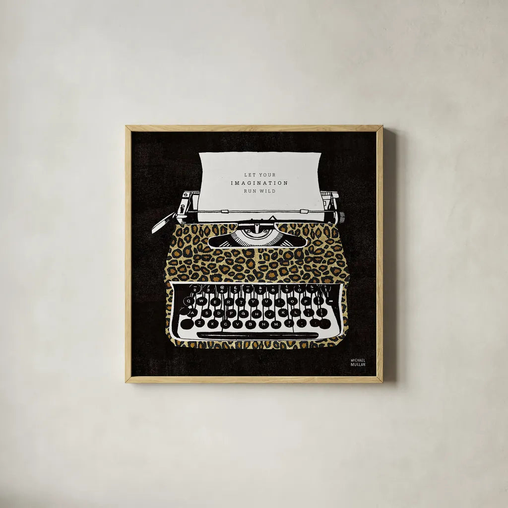 Analog Jungle Typewriter by Michael Mullan. Shown in a natural wood glass frame for a timeless modern aesthetic. Available as an archival giclee rolled canvas, fine art paper, or poster print. SKU 12375a.