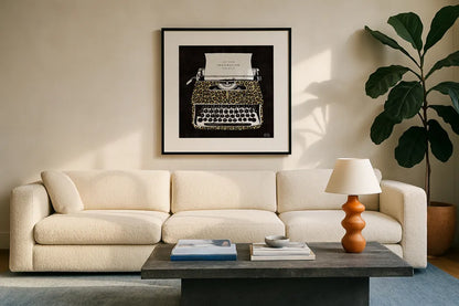 Analog Jungle Typewriter by Michael Mullan. Displayed in a glass frame with matte in a clean modern living room. Available as an archival giclee rolled canvas, fine art paper, or poster print. SKU 12375a.