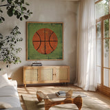 Ball II Green by Michael Mullan. Shown in a natural wood frame in a cozy modern living room. Available as an archival giclee rolled canvas, fine art paper, or poster print. SKU 63514a.