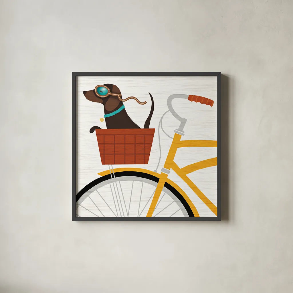 Beach Bums Dachshund Bicycle I by Michael Mullan. Shown in a sleek black glass frame for a contemporary gallery look. Available as an archival giclee rolled canvas, fine art paper, or poster print. SKU 23291a.
