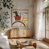 Beach Bums Dachshund Bicycle I by Michael Mullan. Shown in a natural wood frame in a cozy modern living room. Available as an archival giclee rolled canvas, fine art paper, or poster print. SKU 23291a.
