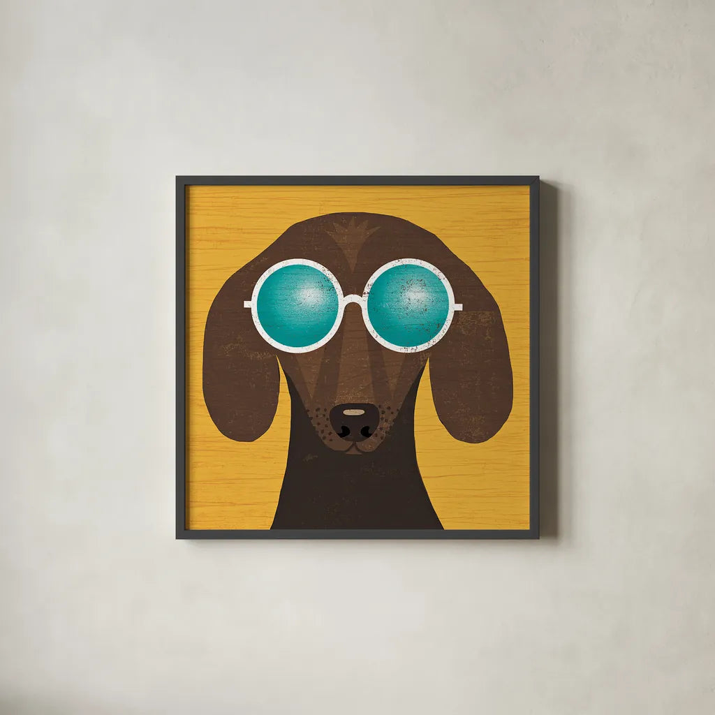 Beach Bums Dachshund I by Michael Mullan. Shown in a sleek black glass frame for a contemporary gallery look. Available as an archival giclee rolled canvas, fine art paper, or poster print. SKU 23289a.