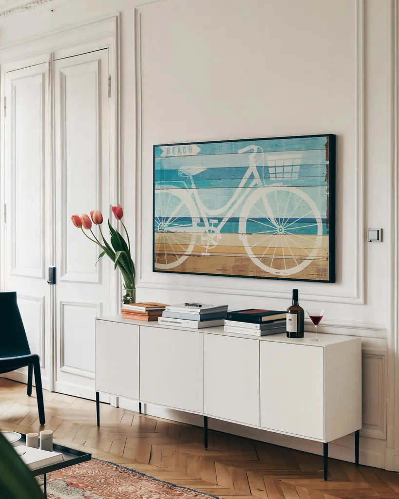 Beachscape Cruiser I by Michael Mullan. shown as a framed stretched canvas in a living room above a console. Available as a archival giclee rolled canvas, fine art paper, or poster print. SKU 23114i.