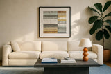 Beachscape II Gold Neutral by Michael Mullan. Displayed in a glass frame with matte in a clean modern living room. Available as an archival giclee rolled canvas, fine art paper, or poster print. SKU 23123a.