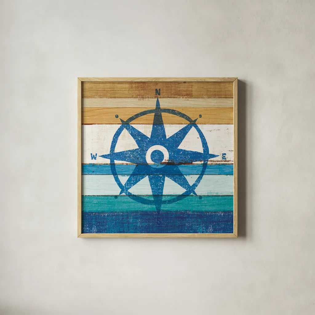 Beachscape IV Compass by Michael Mullan. Shown in a natural wood glass frame for a timeless modern aesthetic. Available as an archival giclee rolled canvas, fine art paper, or poster print. SKU 23131a.