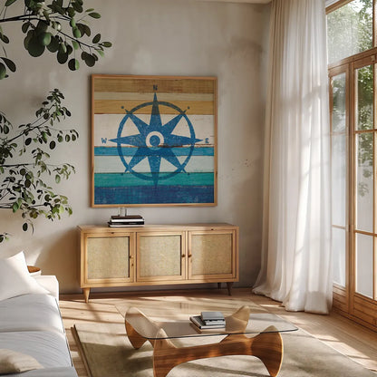 Beachscape IV Compass by Michael Mullan. Shown in a natural wood frame in a cozy modern living room. Available as an archival giclee rolled canvas, fine art paper, or poster print. SKU 23131a.