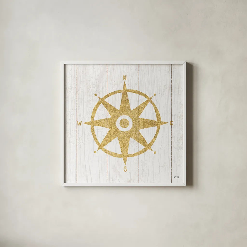 Beachscape IV Compass Gold Neutral by Michael Mullan. Shown in a crisp white glass frame for a clean and minimalist style. Available as an archival giclee rolled canvas, fine art paper, or poster print. SKU 23137a.