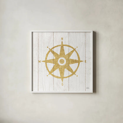 Beachscape IV Compass Gold Neutral by Michael Mullan. Shown in a crisp white glass frame for a clean and minimalist style. Available as an archival giclee rolled canvas, fine art paper, or poster print. SKU 23137a.