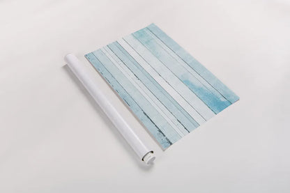 Beachscape IX blue by Michael Mullan. shown as a rolled paper print. Available as archival giclee rolled canvas, fine art paper, or poster print. SKU 44984i.