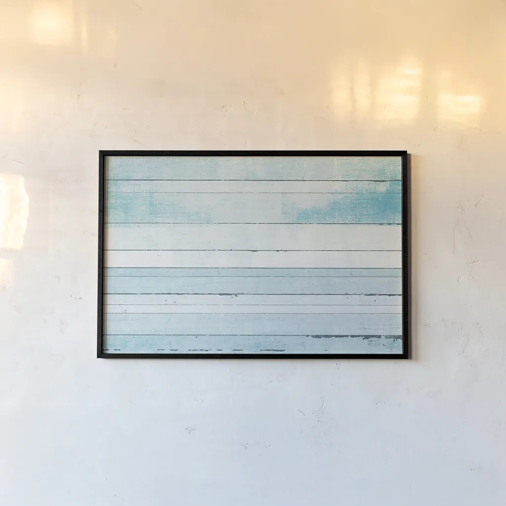 Beachscape IX blue by Michael Mullan. shown as a paper print in a black flame. Available as a archival giclee rolled canvas, fine art paper, or poster print. SKU 44984i.