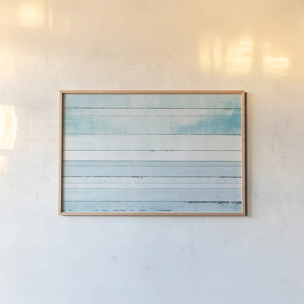 Beachscape IX blue by Michael Mullan. shown as a paper print in a natural frame. Available as a archival giclee rolled canvas, fine art paper, or poster print. SKU 44984i.
