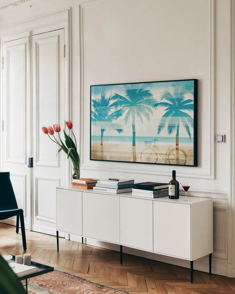 Beachscape Palms I by Michael Mullan. shown as a framed stretched canvas in a living room above a console. Available as a archival giclee rolled canvas, fine art paper, or poster print. SKU 23152i.
