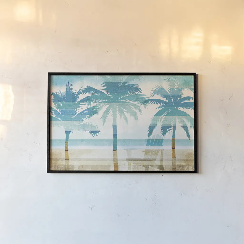 Beachscape Palms with chair by Michael Mullan. shown as a paper print in a black flame. Available as a archival giclee rolled canvas, fine art paper, or poster print. SKU 44889i.