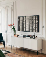 Birch Forest by Michael Mullan. shown as a framed stretched canvas in a living room above a console. Available as a archival giclee rolled canvas, fine art paper, or poster print. SKU 22501i.