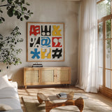 Bold Statement Vintage by Michael Mullan. Shown in a natural wood frame in a cozy modern living room. Available as an archival giclee rolled canvas, fine art paper, or poster print. SKU 61131a.
