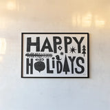 Christmas Whimsy Happy Holidays Black by Michael Mullan. shown as a paper print in a black flame. Available as a archival giclee rolled canvas, fine art paper, or poster print. SKU 79981i.