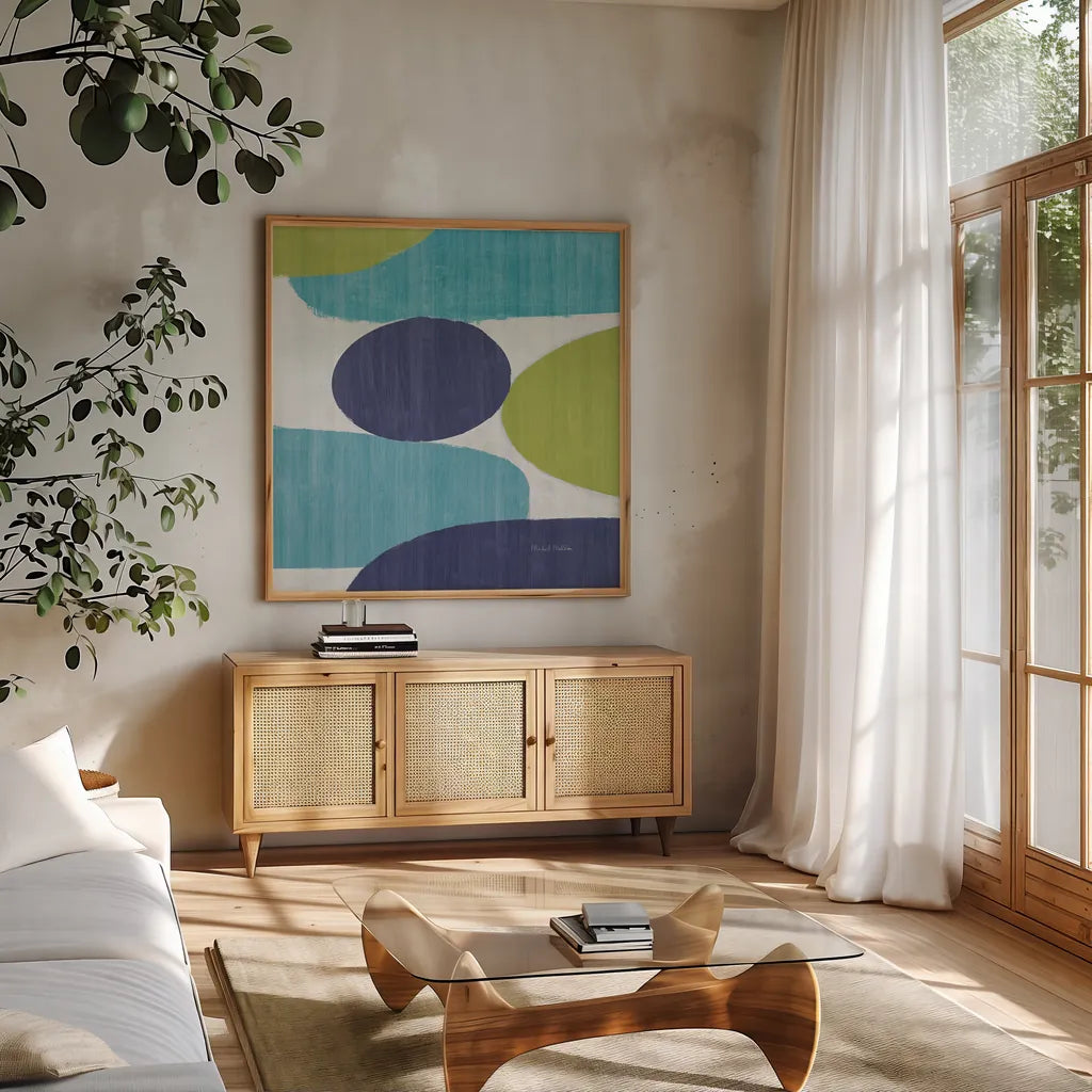 Costa Del Sol II Blue Green by Michael Mullan. Shown in a natural wood frame in a cozy modern living room. Available as an archival giclee rolled canvas, fine art paper, or poster print. SKU 72267a.