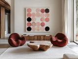 Dots II Square I Pink Black by Michael Mullan. Shown as extra-large giant wall art in a modern living room. Available as an archival giclee rolled canvas, fine art paper, or poster print. SKU 53752a.