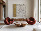 Earth Matter I Gold by Michael Mullan. Shown as extra-large giant wall art in a modern living room. Available as an archival giclee rolled canvas, fine art paper, or poster print. SKU 30295a.