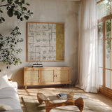 Earth Matter II Gold by Michael Mullan. Shown in a natural wood frame in a cozy modern living room. Available as an archival giclee rolled canvas, fine art paper, or poster print. SKU 30296a.