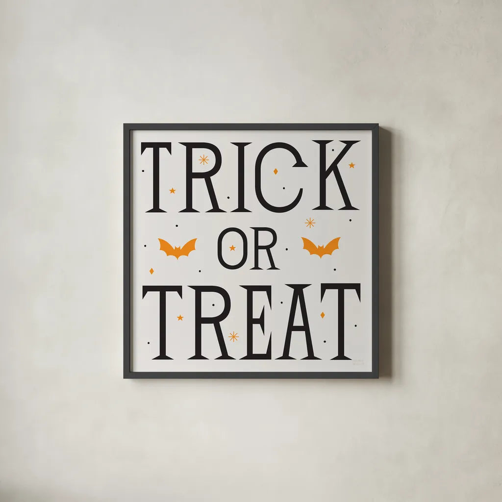 Festive Fright Trick or Treat II by Michael Mullan. Shown in a sleek black glass frame for a contemporary gallery look. Available as an archival giclee rolled canvas, fine art paper, or poster print. SKU 48269a.
