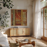 Fire Crop by Michael Mullan. Shown in a natural wood frame in a cozy modern living room. Available as an archival giclee rolled canvas, fine art paper, or poster print. SKU 50636a.