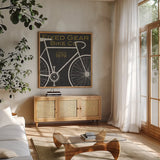 Fixed Gear Bike Co by Michael Mullan. Shown in a natural wood frame in a cozy modern living room. Available as an archival giclee rolled canvas, fine art paper, or poster print. SKU 11868a.