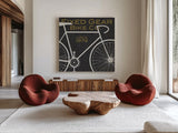 Fixed Gear Bike Co by Michael Mullan. Shown as extra-large giant wall art in a modern living room. Available as an archival giclee rolled canvas, fine art paper, or poster print. SKU 11868a.