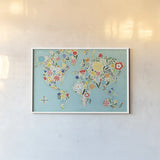 Floral World Blue by Michael Mullan. shown as a paper print in a white frame. Available as a archival giclee rolled canvas, fine art paper, or poster print. SKU 25719i.