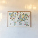 Floral World White by Michael Mullan. shown as a paper print in a natural frame. Available as a archival giclee rolled canvas, fine art paper, or poster print. SKU 25721i.