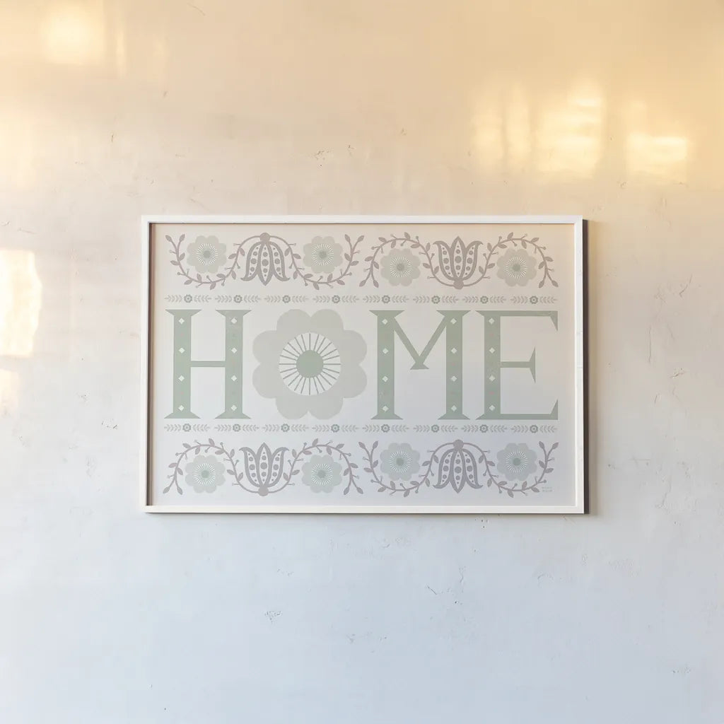 Folk Lodge Home v2 Hygge by Michael Mullan. shown as a paper print in a white frame. Available as a archival giclee rolled canvas, fine art paper, or poster print. SKU 33770i.