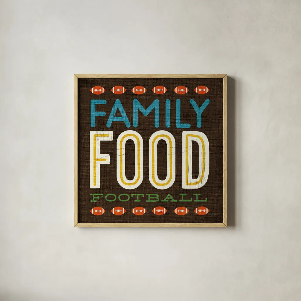 Football I by Michael Mullan. Shown in a natural wood glass frame for a timeless modern aesthetic. Available as an archival giclee rolled canvas, fine art paper, or poster print. SKU 17535a.