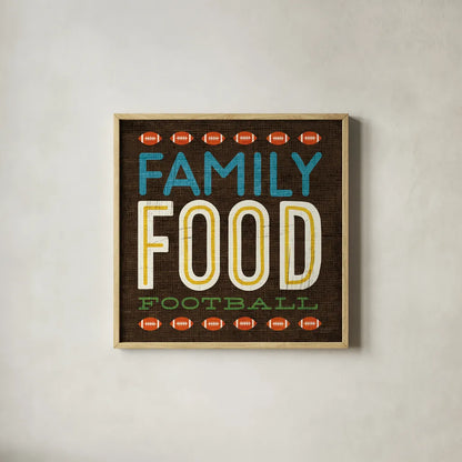 Football I by Michael Mullan. Shown in a natural wood glass frame for a timeless modern aesthetic. Available as an archival giclee rolled canvas, fine art paper, or poster print. SKU 17535a.