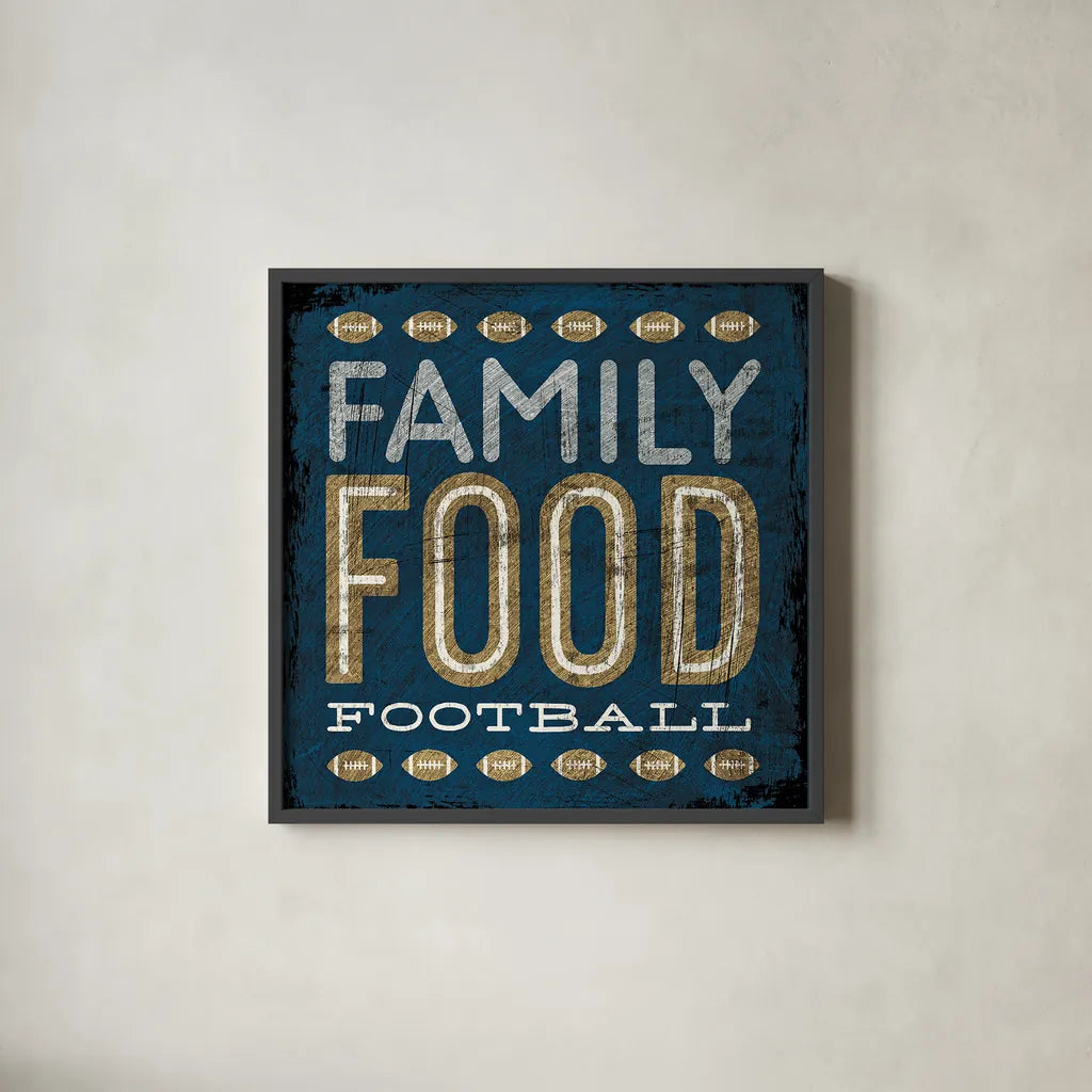 Football I Blue by Michael Mullan. Shown in a sleek black glass frame for a contemporary gallery look. Available as an archival giclee rolled canvas, fine art paper, or poster print. SKU 20346a.