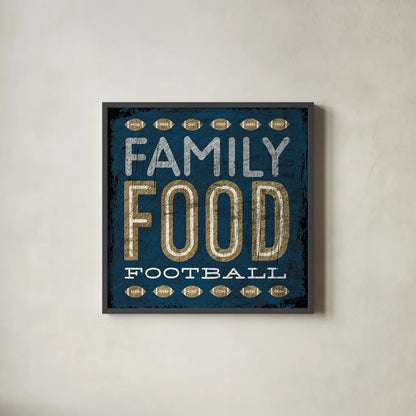 Football I Blue by Michael Mullan. Shown in a sleek black glass frame for a contemporary gallery look. Available as an archival giclee rolled canvas, fine art paper, or poster print. SKU 20346a.