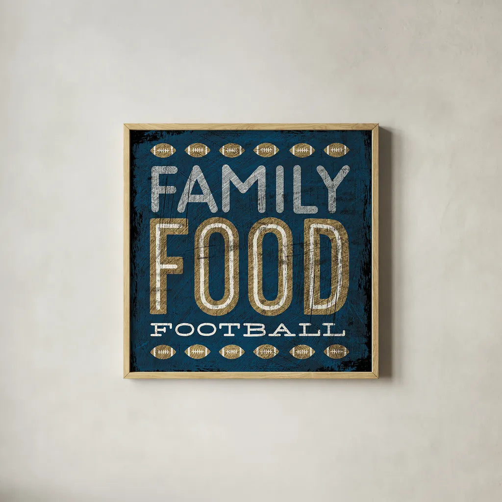 Football I Blue by Michael Mullan. Shown in a natural wood glass frame for a timeless modern aesthetic. Available as an archival giclee rolled canvas, fine art paper, or poster print. SKU 20346a.