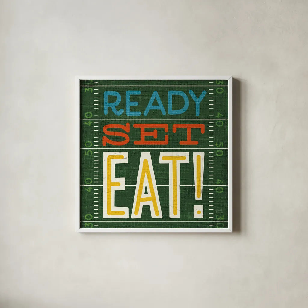 Football II by Michael Mullan. Shown in a crisp white glass frame for a clean and minimalist style. Available as an archival giclee rolled canvas, fine art paper, or poster print. SKU 17536a.