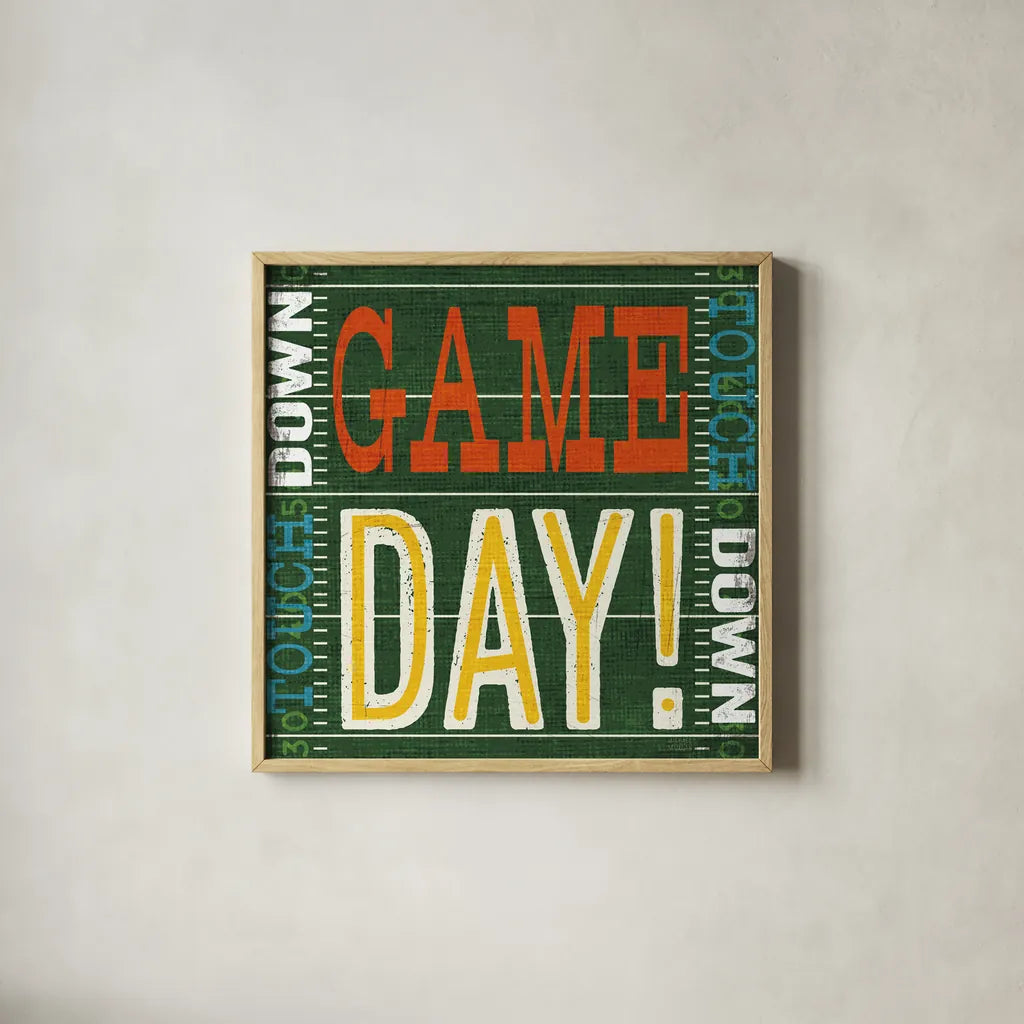 Football II by Michael Mullan. Shown in a natural wood glass frame for a timeless modern aesthetic. Available as an archival giclee rolled canvas, fine art paper, or poster print. SKU 61614a.