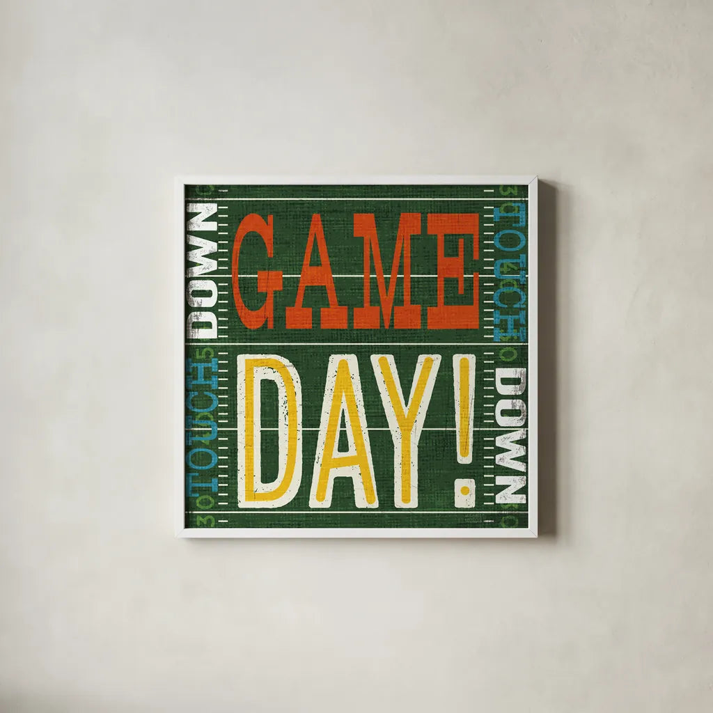 Football II by Michael Mullan. Shown in a crisp white glass frame for a clean and minimalist style. Available as an archival giclee rolled canvas, fine art paper, or poster print. SKU 61614a.