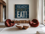 Football II Blue by Michael Mullan. Shown as extra-large giant wall art in a modern living room. Available as an archival giclee rolled canvas, fine art paper, or poster print. SKU 20347a.