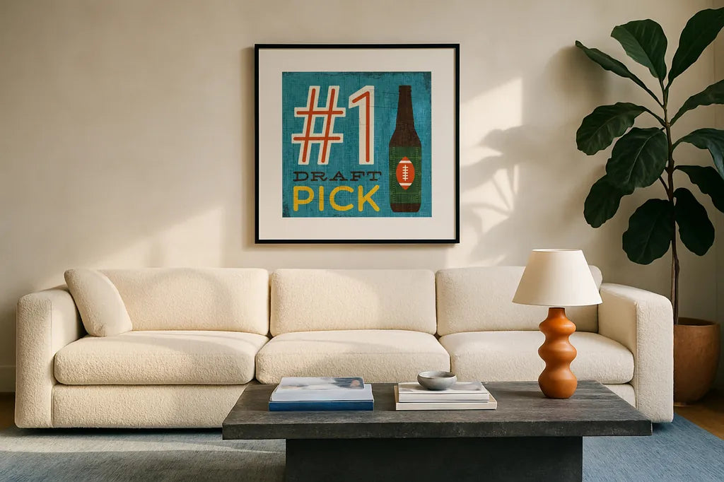 Football III by Michael Mullan. Displayed in a glass frame with matte in a clean modern living room. Available as an archival giclee rolled canvas, fine art paper, or poster print. SKU 17537a.
