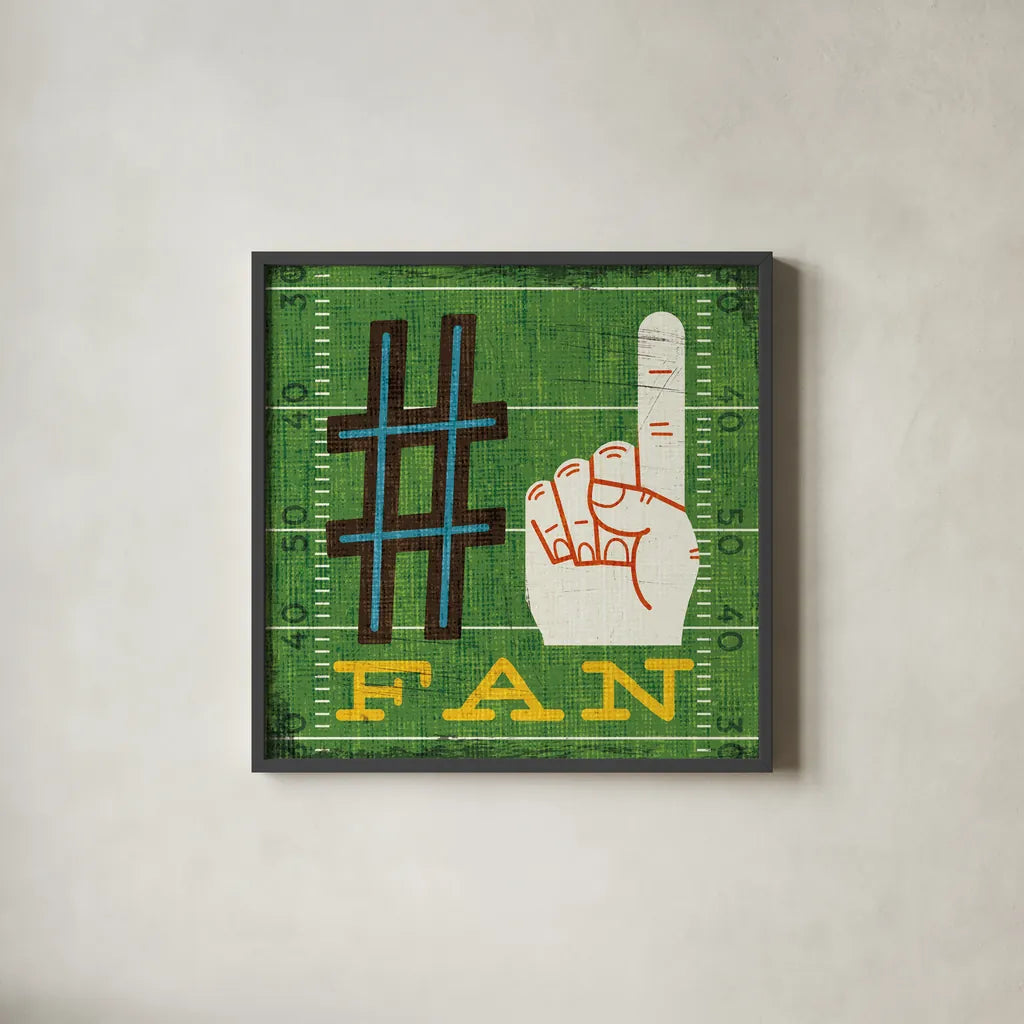 Football IV by Michael Mullan. Shown in a sleek black glass frame for a contemporary gallery look. Available as an archival giclee rolled canvas, fine art paper, or poster print. SKU 20344a.