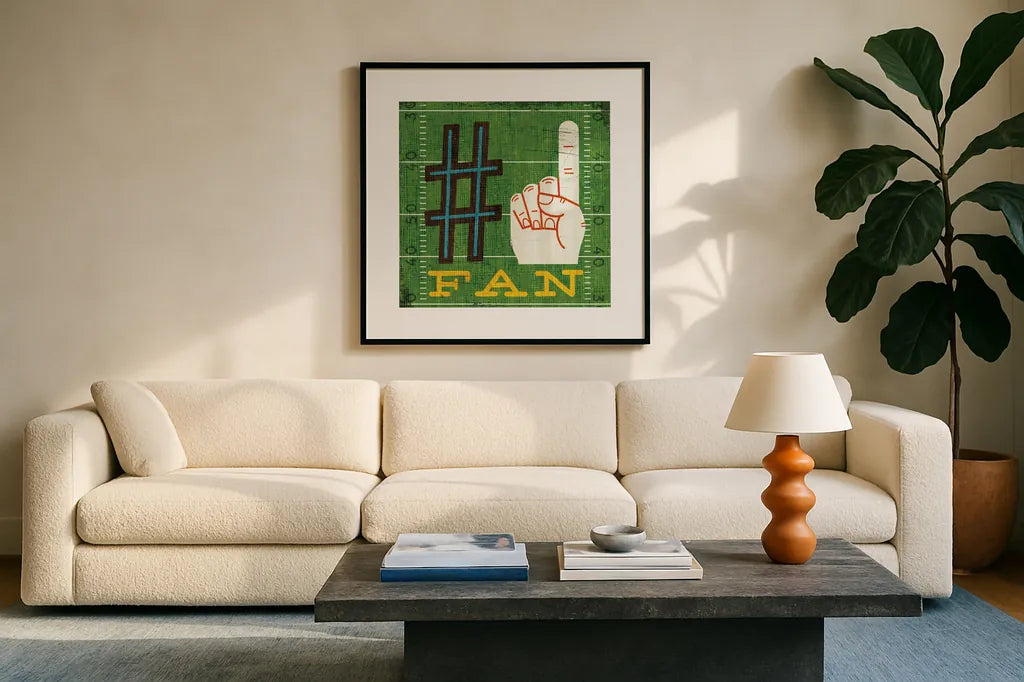 Football IV by Michael Mullan. Displayed in a glass frame with matte in a clean modern living room. Available as an archival giclee rolled canvas, fine art paper, or poster print. SKU 20344a.
