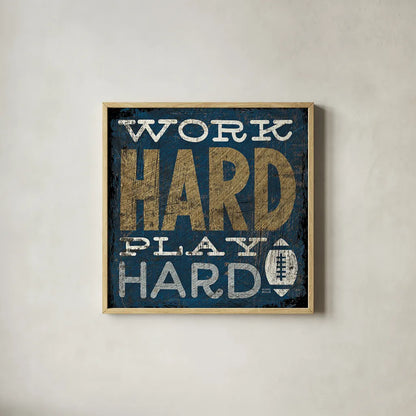 Football V Blue by Michael Mullan. Shown in a natural wood glass frame for a timeless modern aesthetic. Available as an archival giclee rolled canvas, fine art paper, or poster print. SKU 20350a.