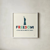 Freedom Liberty by Michael Mullan. Shown in a crisp white glass frame for a clean and minimalist style. Available as an archival giclee rolled canvas, fine art paper, or poster print. SKU 99013a.