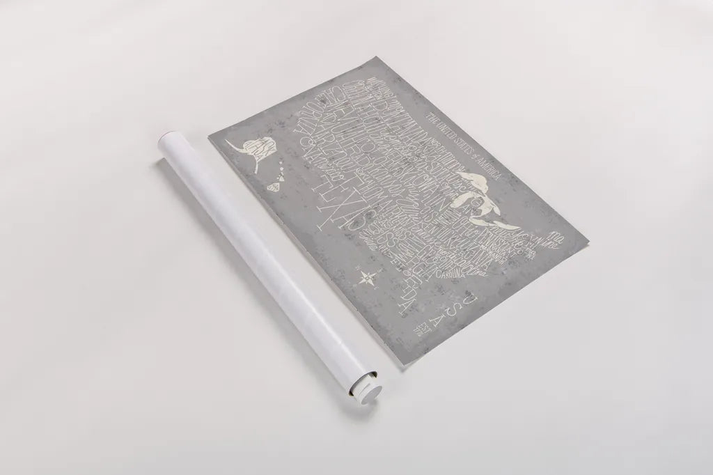 Hand Lettered USA Map Gray by Michael Mullan. shown as a rolled paper print. Available as archival giclee rolled canvas, fine art paper, or poster print. SKU 43245i.