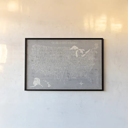 Hand Lettered USA Map Gray by Michael Mullan. shown as a paper print in a black flame. Available as a archival giclee rolled canvas, fine art paper, or poster print. SKU 43245i.